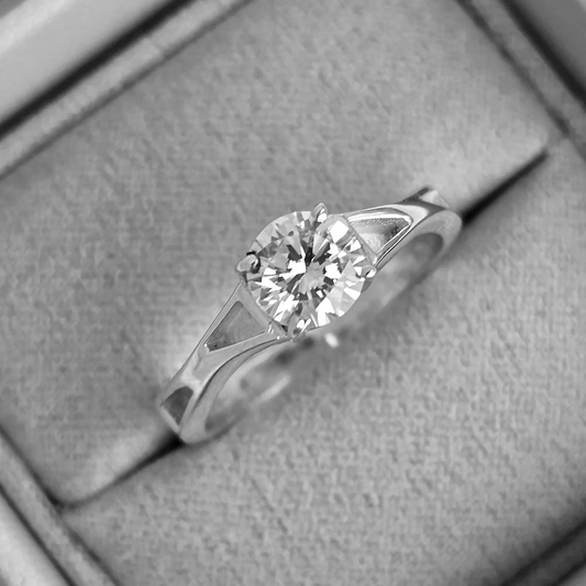 MEMORIAL QUAD CHANNEL SOLITAIRE RING